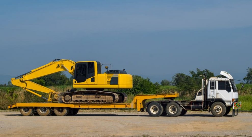 Excavator Or Backhoe On The Truck — Whybirds Transport in Raceview, QLD